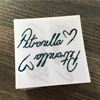 Sample close up of  40mm x 40mm , Polyester Satin Tags