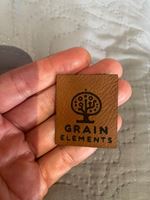 Picture of Faux Leather  Tags 30mm x 30mm -100 units. Laser Engraved
