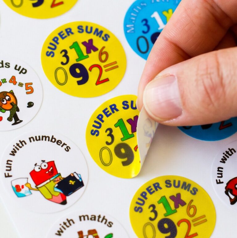 Maths reward stickers being peeled from a sheet